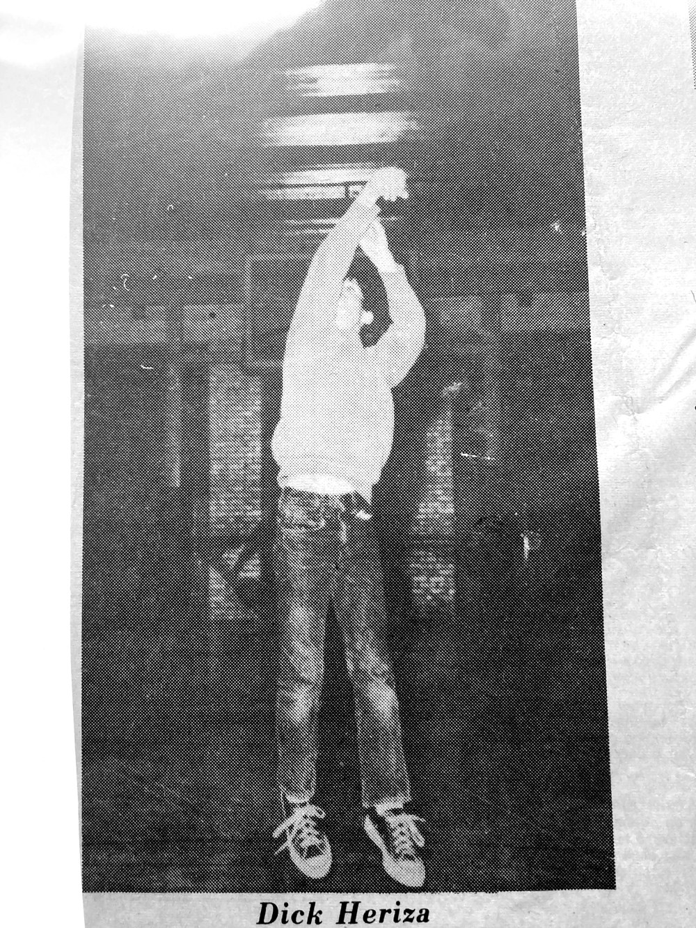 Newspaper clipping featuring Dick Heriza